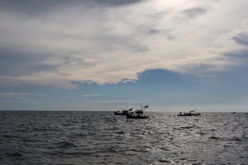 fishing boat at sunset