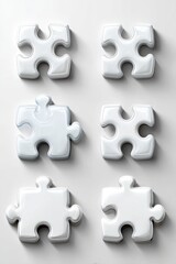 Six white jigsaw puzzle pieces arranged on a white surface