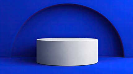 White podium under a blue arch backdrop, minimalist