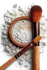 Powder, brushes on white backdrop. Beauty product still life