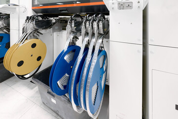 SMT pick-and-place machine with tape feeders in a modern electronic manufacturing facility