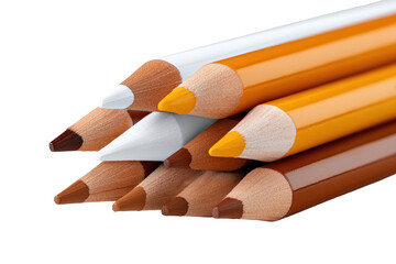 Stacked pencils in earth tones, white; dark background, sharp focus