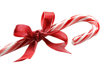 Red and white candy cane with a festive tied red ribbon