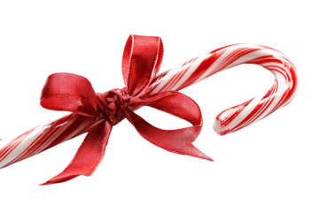Red and white candy cane with a festive tied red ribbon