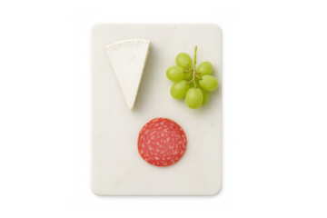 Serving a fresh appetizer platter with brie cheese, salami slice, and green grapes, perfect for entertaining with transparent background