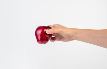 Red apple in hand white background