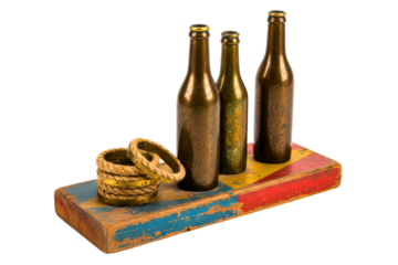 Vintage carnival ring toss game with old bottles and rope rings isolated on a transparent background