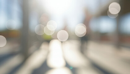 Fototapeta premium Soft abstract scene of bright sunlight forming circular bokeh along an outdoor pathway, blending warm natural tones with a dreamy glow that captures calm movement and gentle light.