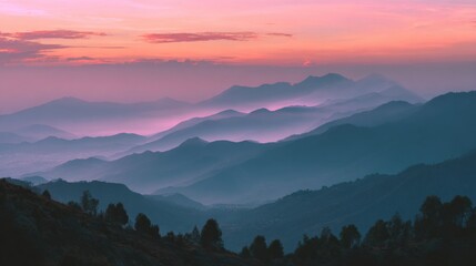 Obraz premium Serene Mountain Landscape at Dusk with Gentle Hues and Mystical Fog Overlapping the Rolling Hills in a Peaceful Natural Environment