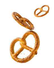 Appetizing salty baked pretzel floating on transparency background. crunchy, traditional, savory German snack food in fun, dynamic motion