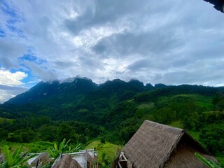 Green yard with mountain chiang dao located in Chiang mai northern part of Thailand