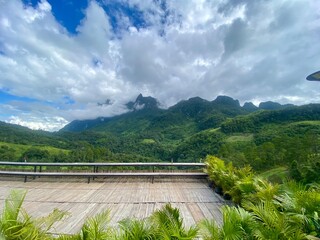 Green yard with mountain chiang dao located in Chiang mai northern part of Thailand