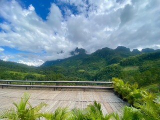 Green yard with mountain chiang dao located in Chiang mai northern part of Thailand