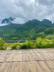 Green yard with mountain chiang dao located in Chiang mai northern part of Thailand