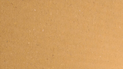 Brown paper texture background for presentation product. Pastel peach illumination, grainy color gradient background,
