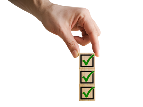 Hand placing check mark blocks isolated on transparent background