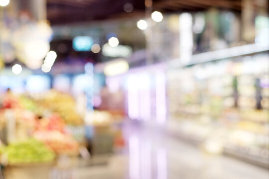 Blurred background, blur grocery supermarket at shopping store banner, blurry shelf product display and customer people  backdrop, wallpaper copy space for business concept