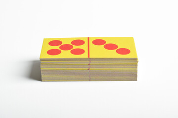 A stack of dominoes isolated on a white background