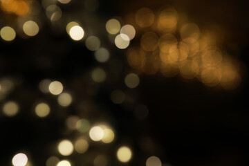 Defocused Warm and Cool Bokeh Lights on Dark Background - Abstract and Atmospheric Light Patterns