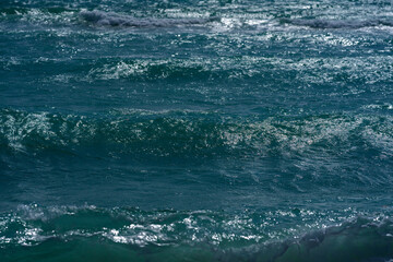 Fototapeta premium Sea wave. Blue ocean waves. Foamy wave. Rolling sea beach waves. Gentle sea beach wave. Summer sea beach.