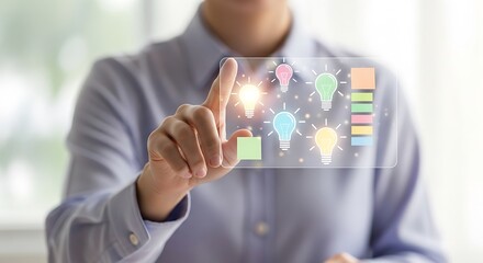 Person touching a holographic screen displaying multiple light bulbs, symbolizing ideas and innovation, with one bulb glowing brightly