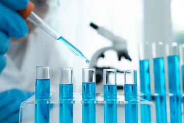 Scientist analyze biochemical samples in advanced scientific laboratory. Medical professional use dropper mix microbiological developmental of viral. Biotechnology research in  science lab. cosmetic