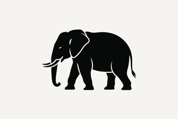 Obraz premium Black silhouette of a majestic elephant walking against a light background