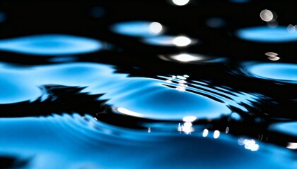 Serene blue water surface with gentle ripples and shimmering light bokeh on a dark black background, abstract liquid texture for flow, wellness, and technology concepts.
