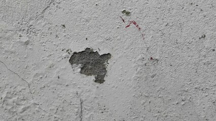 old paint on the wall. old wall texture. red paint on the wall.