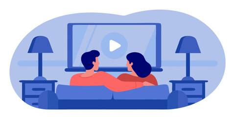 Obraz premium Couple watching a movie together on a couch in a cozy living room - Concept of Black Friday 