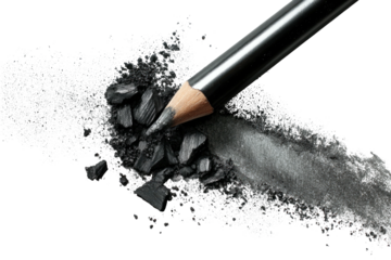 Charcoal pencil, shavings, and a stroke on black surface