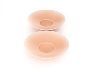 Beige silicone nipple covers for discreet comfort on white background. 3d illustration
