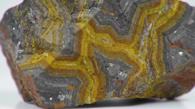 Complex Banded Mineral Specimen with Yellow Brown and Gray Layers