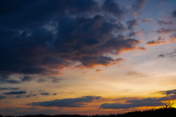  Sunset sky clouds in the Evening with Golden orange sunlight in golden hour, Dusk sky background