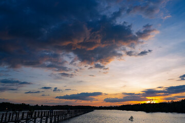  Sunset sky clouds in the Evening with Golden orange sunlight in golden hour, Dusk sky background