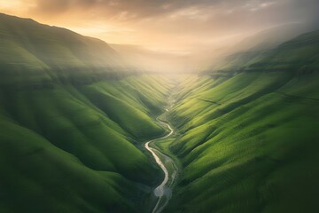 Breathtaking aerial view of a winding river flowing through lush green rolling hills and valleys illuminated by a golden sunrise with dramatic clouds and mist creating a mystical atmosphere