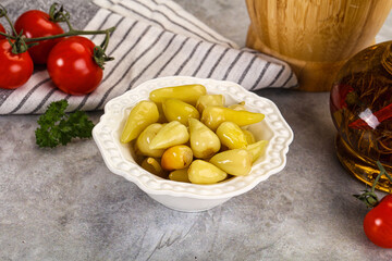 Turkish traditional marinated mini chili peppers