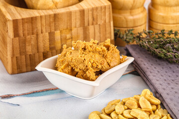 Crunchy peanut butter fat product