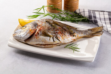 Baked dorada fish with spices
