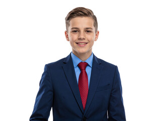 A young boy in a formal suit smiles confidently, showcasing a blue jacket, light blue shirt, and a red tie.