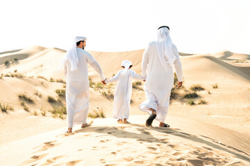 Three generation family making a safari in the desert of Dubai