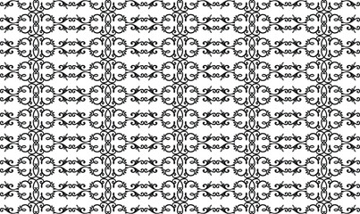 Intricate black and white repeating floral pattern