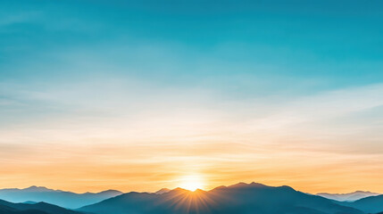 Obraz premium Sunrise over mountain silhouette creates serene atmosphere with vibrant colors