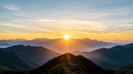 Naklejka premium Golden sunrise over mountain silhouette creates serene and calm atmosphere