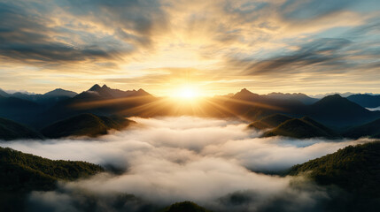 Obraz premium Majestic mountain sunrise over fog layer creates cinematic atmosphere