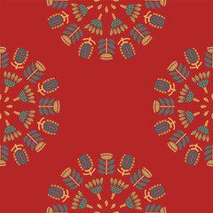 Seamless design in red and blue tones. Symmetrical circular pattern.