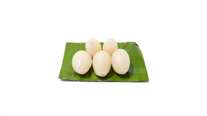 Peeled Rambutan Fruits on Banana Leaf Isolated on White Background