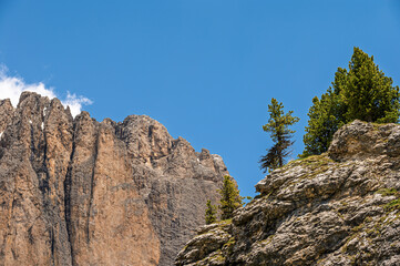 Sella mountain range and Sasso Pordoi images from Col Rodella with a cloudy sky in the background, Dolomites, Italy