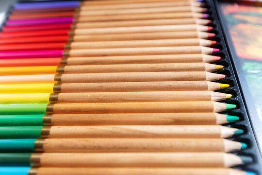 Set of colored pencils for artists in a metal box