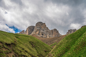 Obraz premium Sasso Lungo mountain range images with a cloudy sky in the background, Val di fassa, Dolomites, Italy